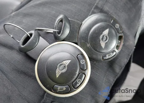 2009 Mini Cooper z USA, uszkodzony, nr VIN WMWMR335X9TJ94478